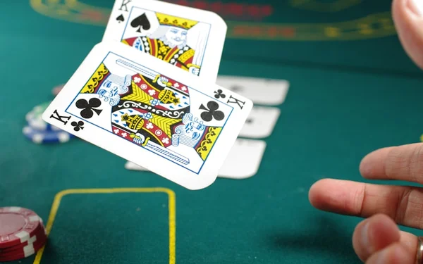 Live blackjack table with dealer and cards